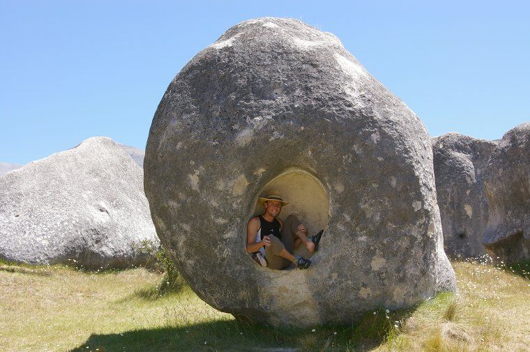 Chilling in a limestone “egg” at Castle Hill, New Zealand
